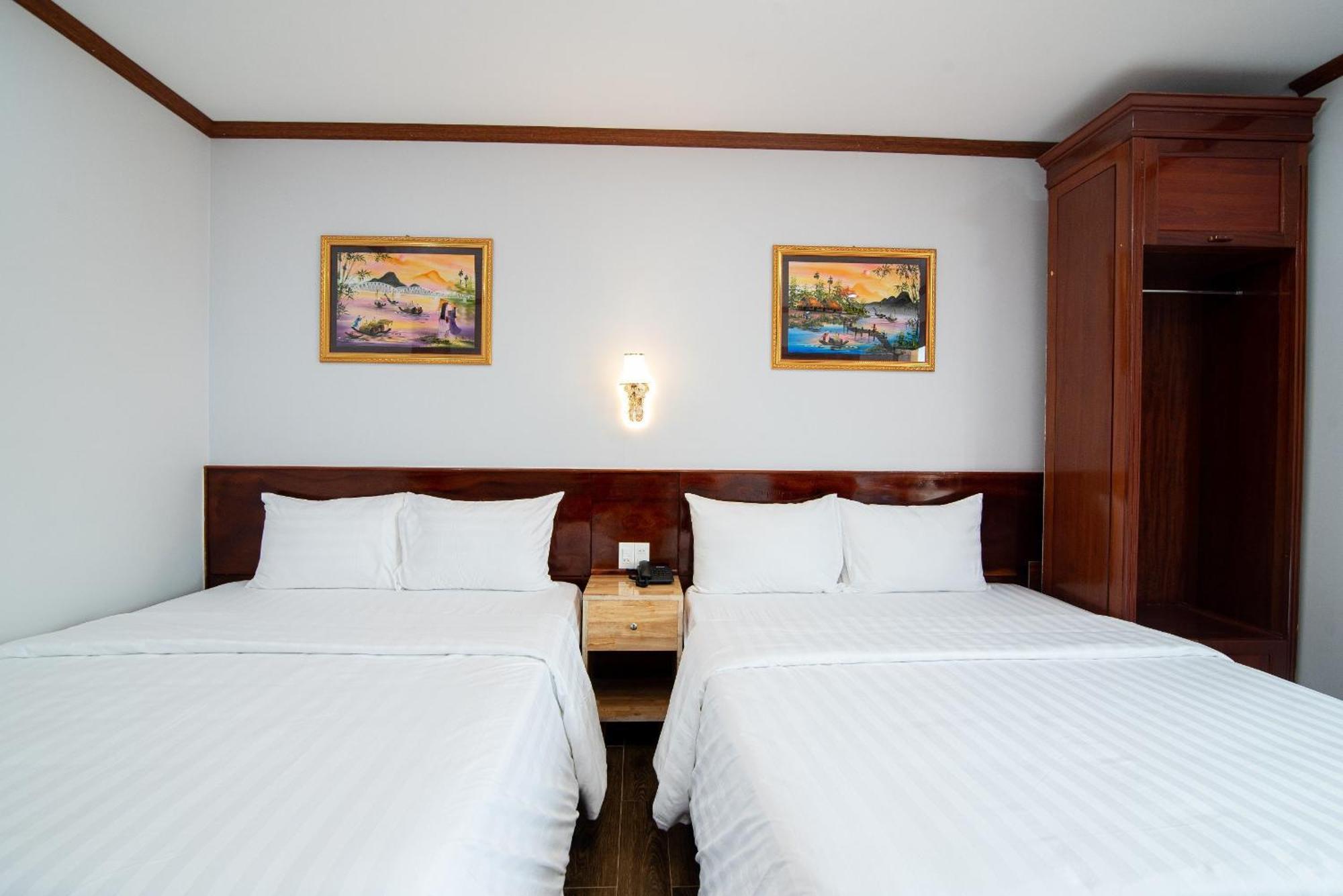 Minh Quang Hotel ドンホイ エクステリア 写真